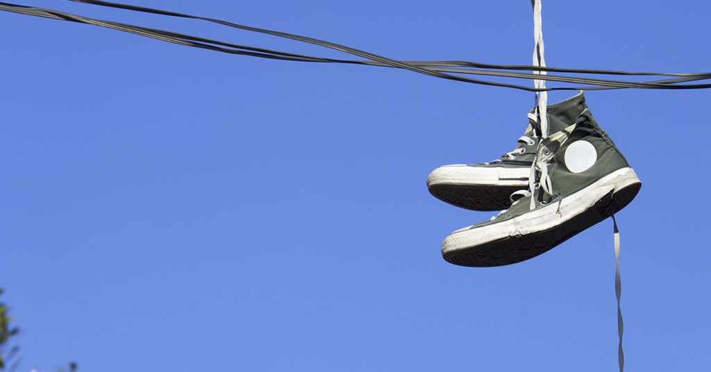 What Does it Mean When You See Shoes Thrown on a Power Line? The