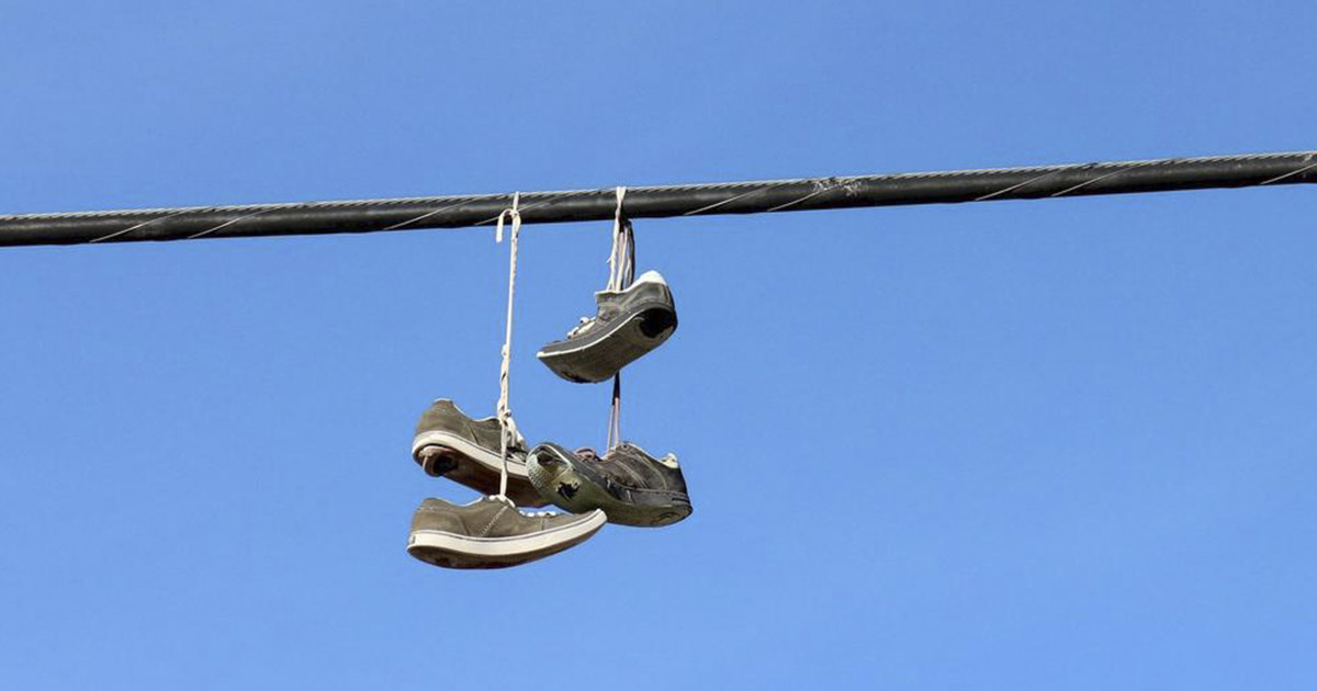 What Does it Mean When You See Shoes Thrown on a Power Line? The