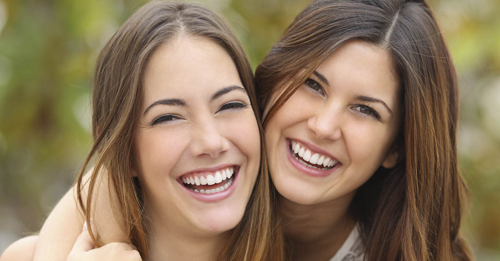 Study Finds That Sisters Help Protect Siblings From Depression - Featured image