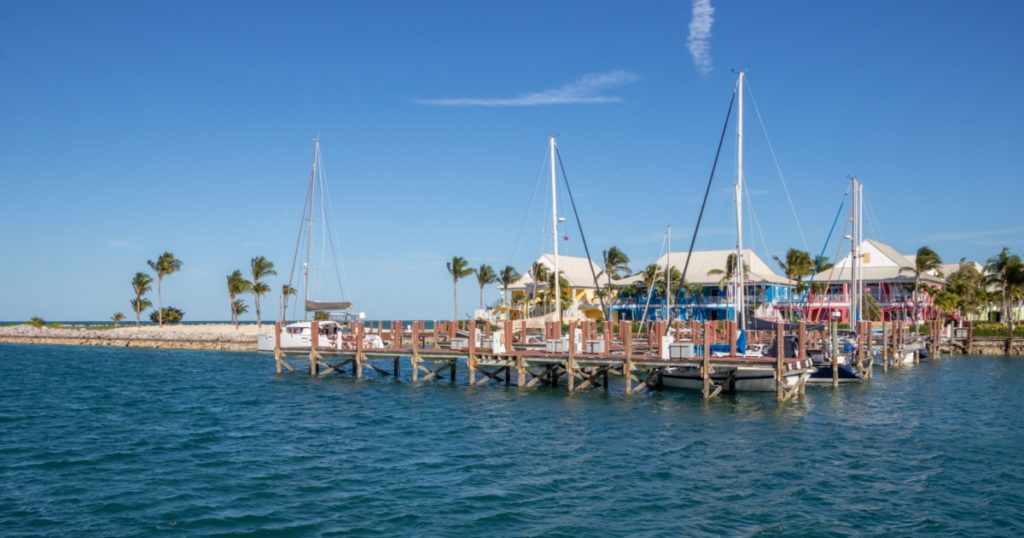 West End, Grand Bahama Island, Bahamas - January 6, 2023: Colourful villas and a marina at Old Bahamas Bay. The marina is only 55 nautical miles from Palm Beach, Florida.