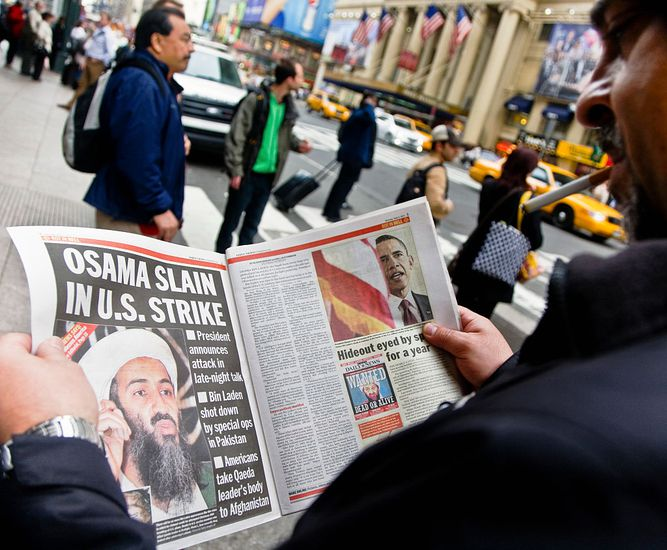 A newspaper with the news of Osama Bin Laden being assassinated.