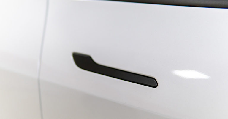 Some Tesla Owners Have Been Locked Inside After Losing Power. Here’s How to Manually Open a Tesla Door if You Get Stuck - Featured image