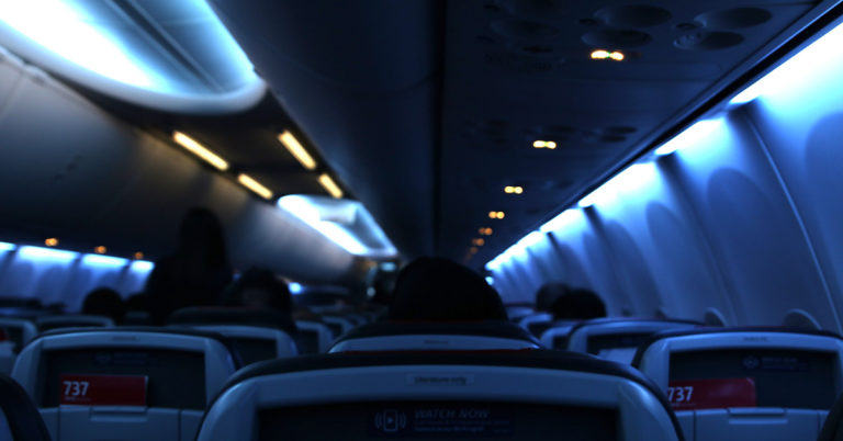 Why do Airline Crews Dim The Cabin Lights? (It’s Not to Help You Sleep) - Featured image