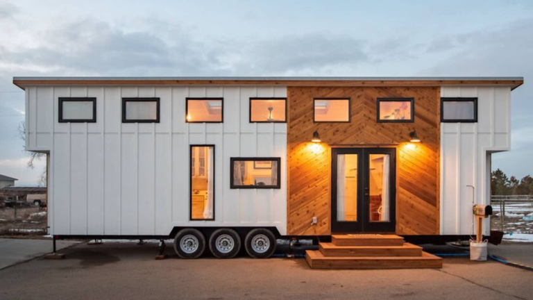 I live in a backyard ‘tiny home on wheels’ for $725 a month—here’s why I’m the happiest I’ve ever been - Featured image