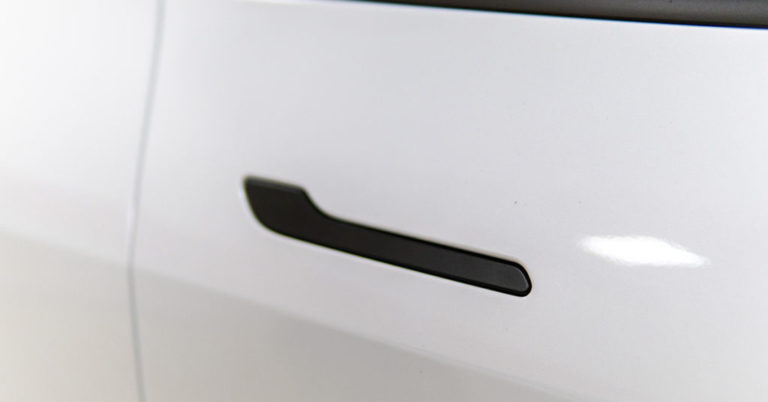 Some Tesla Owners Have Been Locked Inside After Losing Power. Here’s How to Manually Open a Tesla Door if You Get Stuck - Featured image