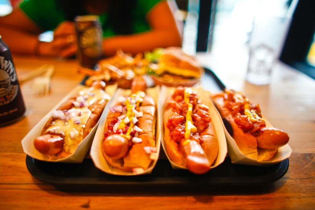 Close-Up Photo Of Hot Dog On Sandwiches
