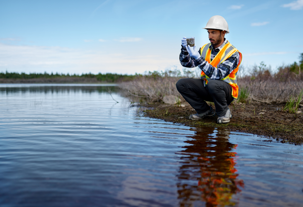 Marine biologist analysing water test results and algea samples