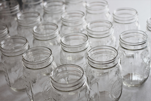 Empty mason jars lined up.