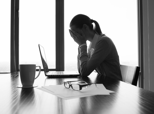 Depressed woman in the office