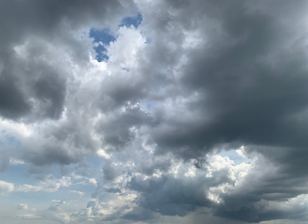 Big gray stratocumulus clouds With the air moving up and down in the same way as the waves and when the weather rises, it creates a layer of clouds up into the beautiful sky at Thailand.