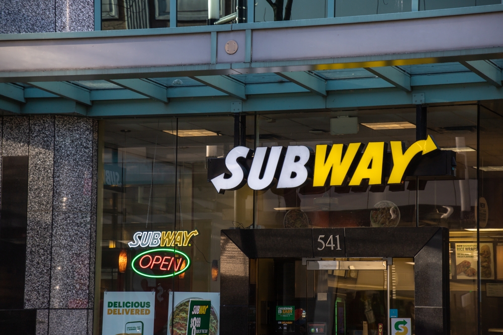 Vancouver, CANADA - Jan 28 2023 : Storefront of Subway in Downtown Vancouver. Subway is an US fast food restaurant franchise that specializes in submarine sandwiches (subs), wraps, salads and drinks