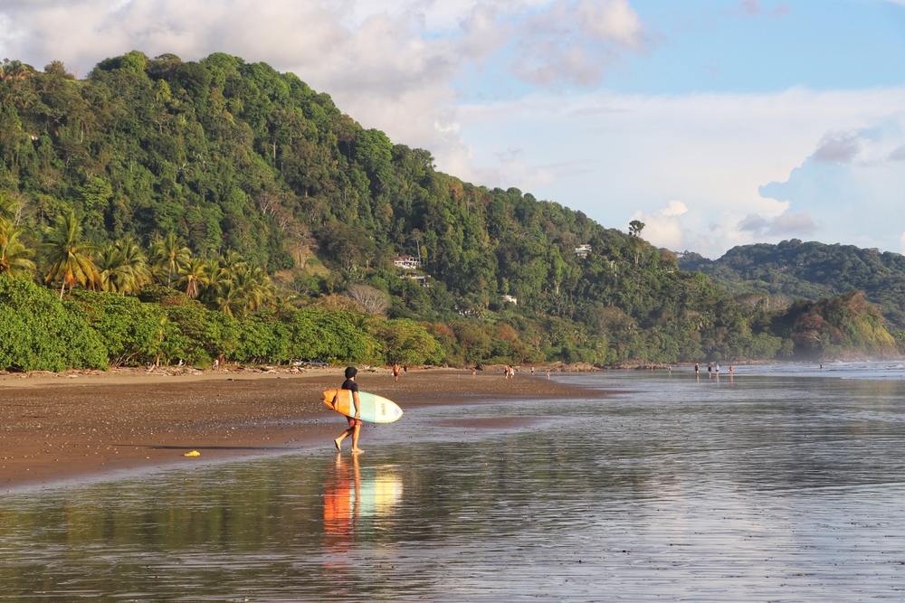 Dominical, Costa Rica - March, 2023: Costa Rica is one of the best surfing spots along the Pacific Ocean and surfers from all over the world are coming to explore the popular destinations.