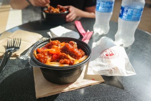Chicago, Illinois, United States - 2.19.2017: food from Panda Express fast food restaurant, a bowl with Orange Chicken
