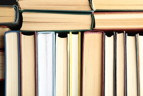 Many different hardcover books as background, top view