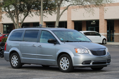 Detroit, USA - 21 October, 2023: Chrysler Town and Country and Lancia Voyager were the predecessor of Chrysler Pacifica during model year of 2011-2016.