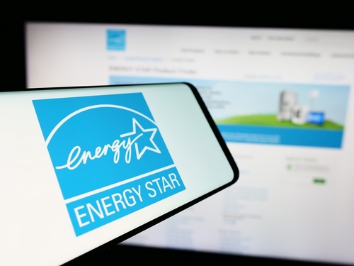 Stuttgart, Germany - 07-01-2024: Cellphone with logo of American energy efficiency program Energy Star in front of website. Focus on center of phone display. Unmodified photo.