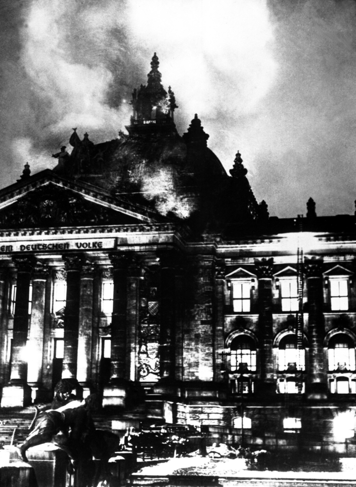 The burning Reichstag in February 27, 1933. The fire broke out simultaneously in 20 places, enabling Hitler to seize power under the pretext of 'protecting' Germany.