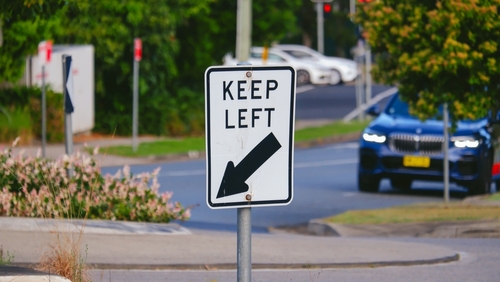 Keep Left—stay in the left lane and follow the flow. Easy and safe driving ahead!