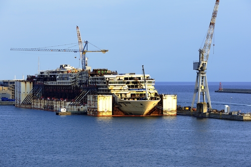 The remains of the troubled Costa Concordia in the breakers yard, Genoa