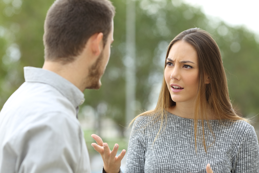 woman irritated with man