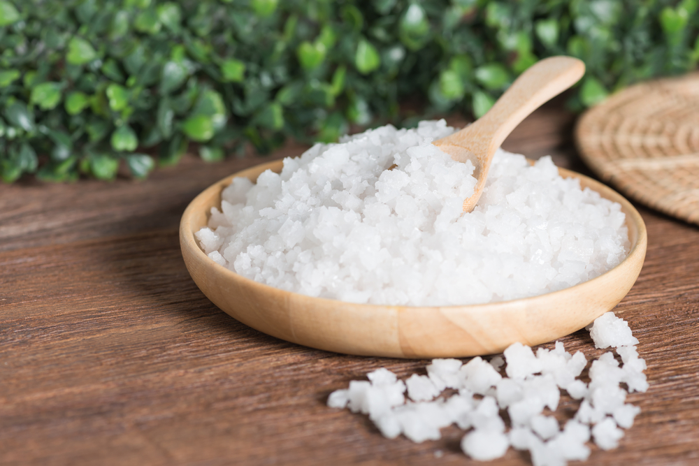 Sea salt epsom in wood plate.