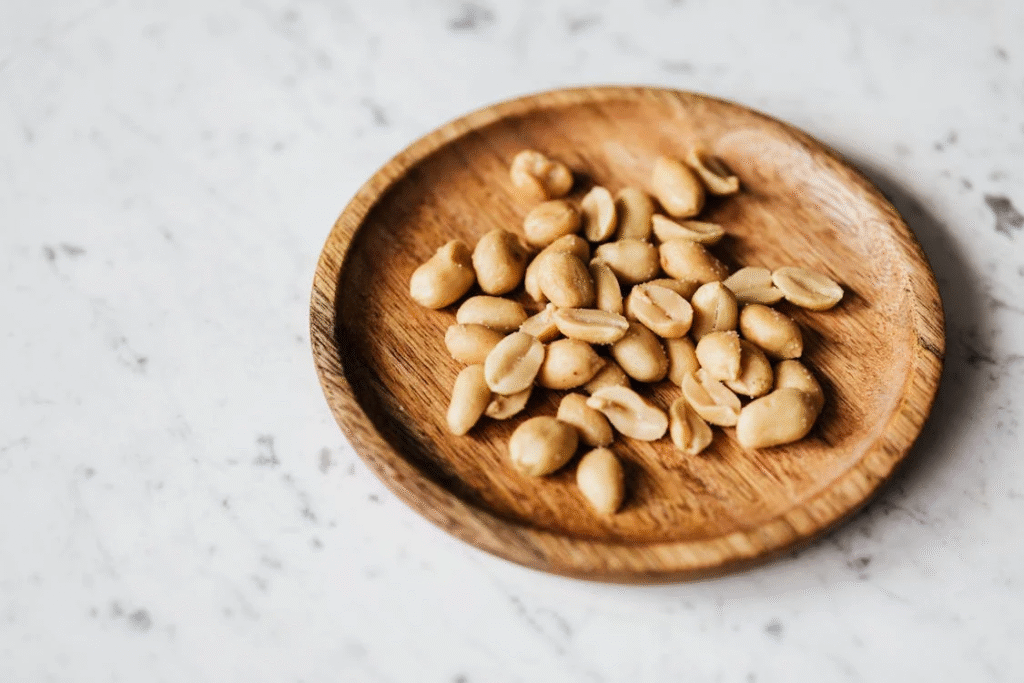 peanuts on wooden plate