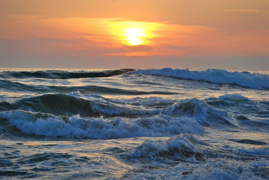 waves and golden sunset