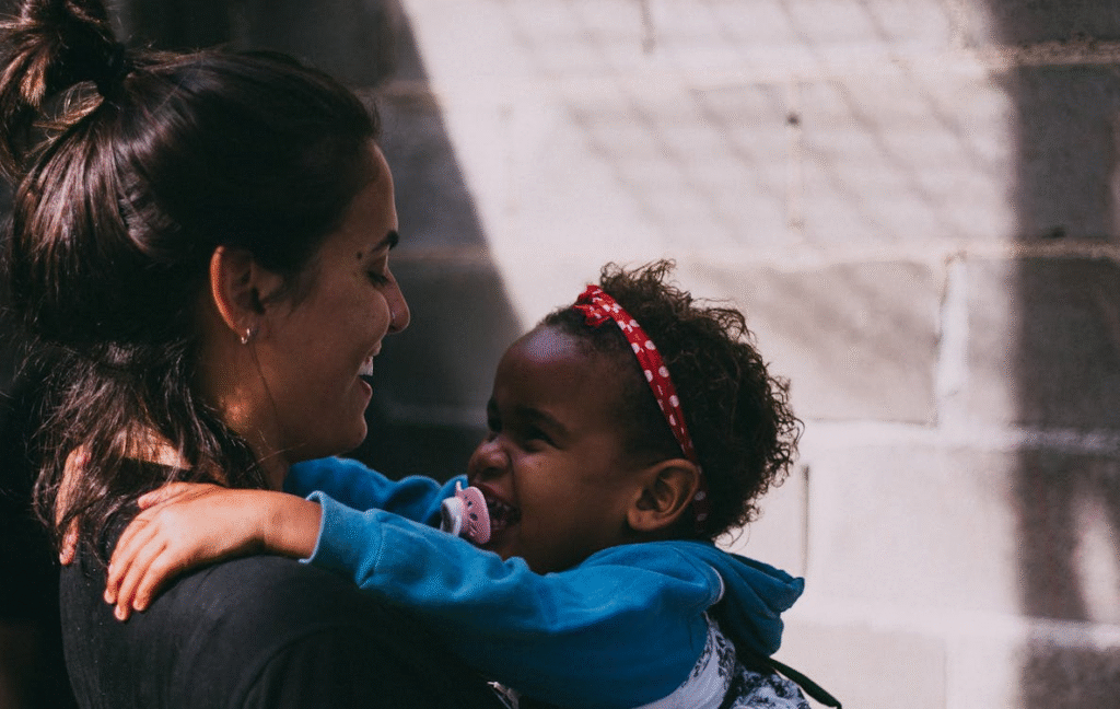 mother holding child