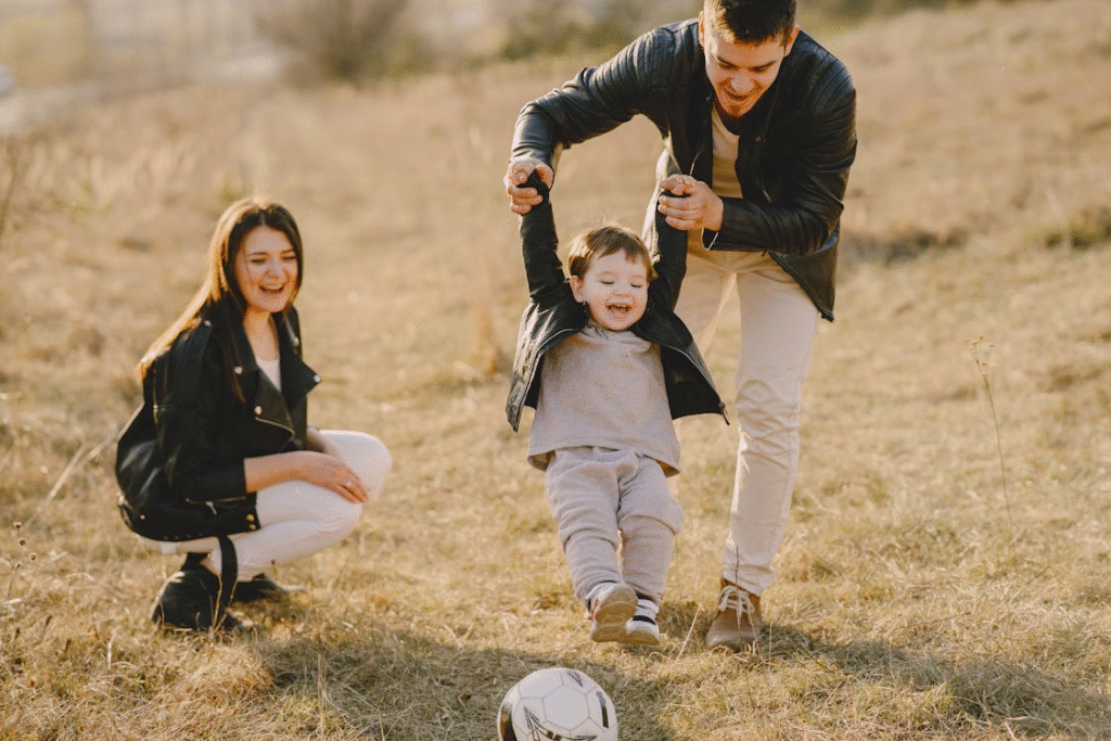 happy family playing with child