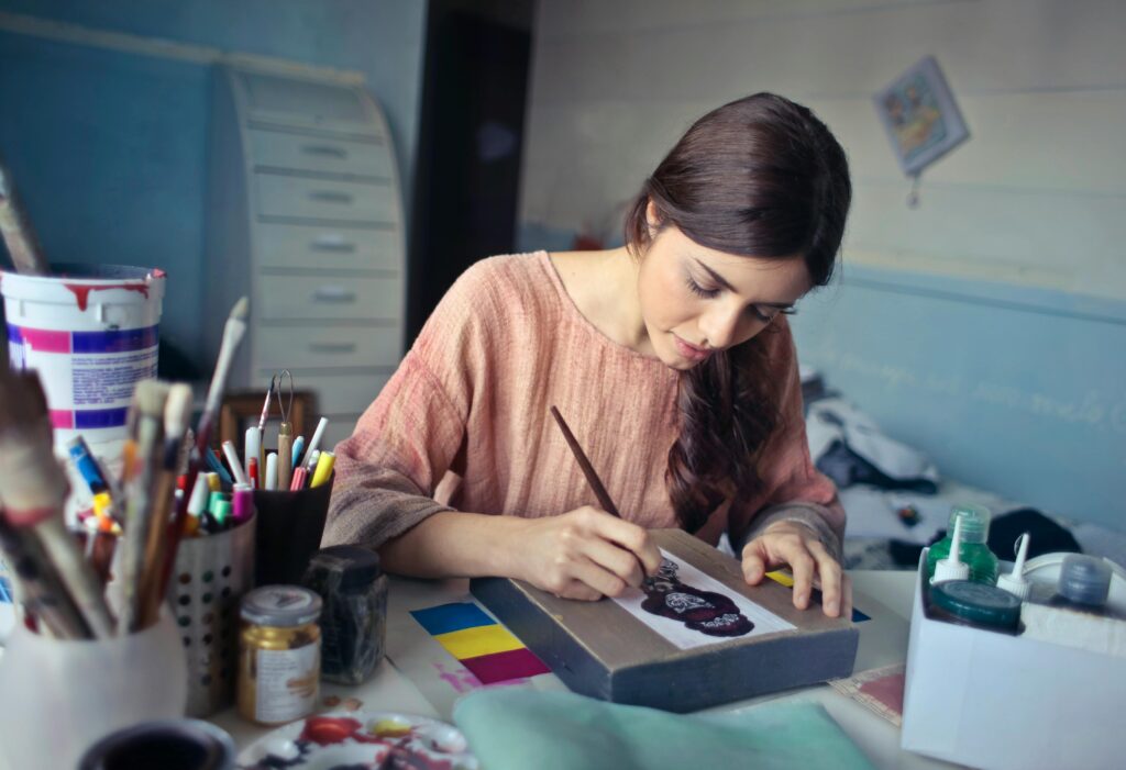 Woman in Brown Scoop-neck Long-sleeved Blouse Painting
