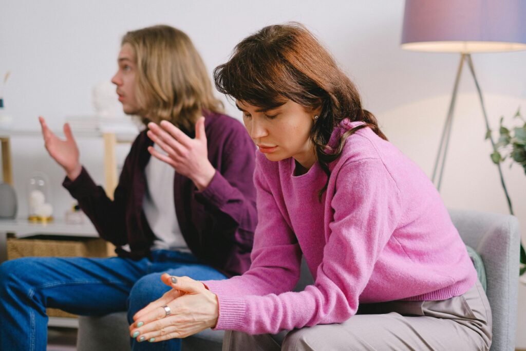 woman in pink top on couch 