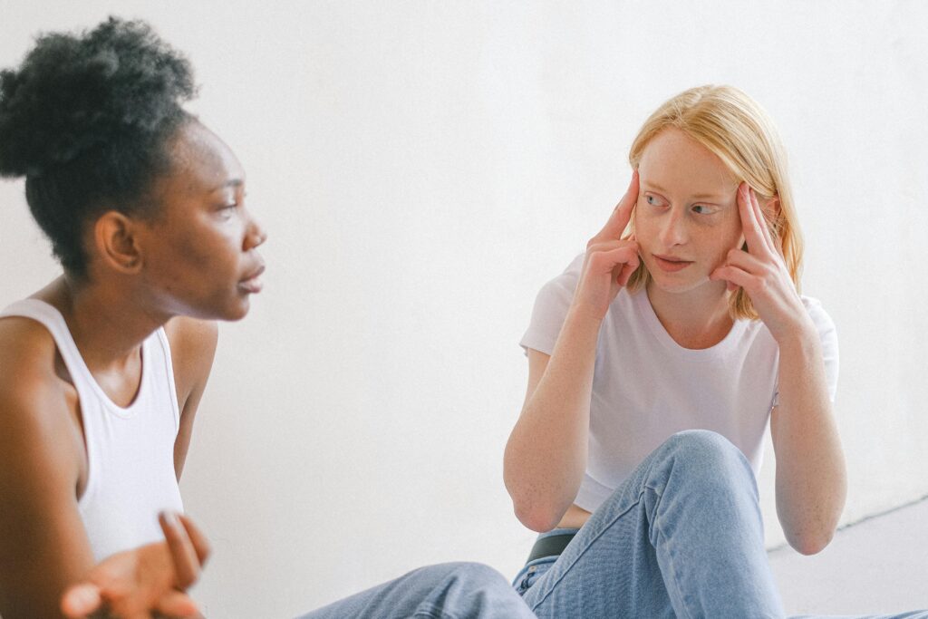 multi racial women talking
