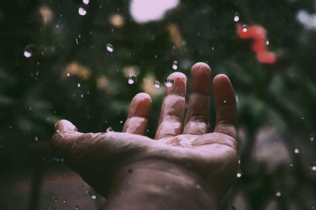 hand catching water