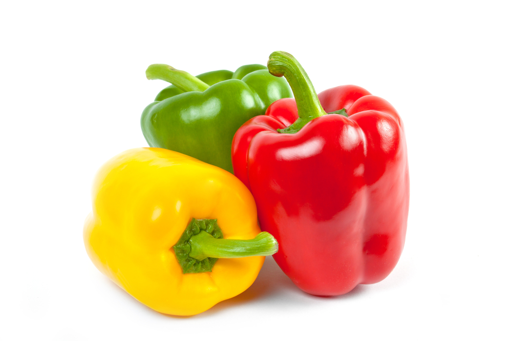 three bell peppers isolated on white background