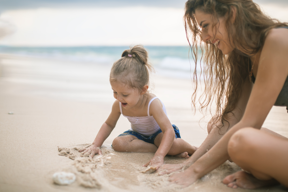 mother and child at the beach