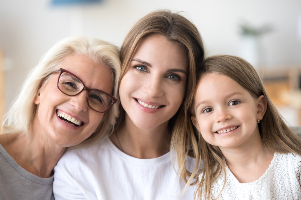 3 women smiling