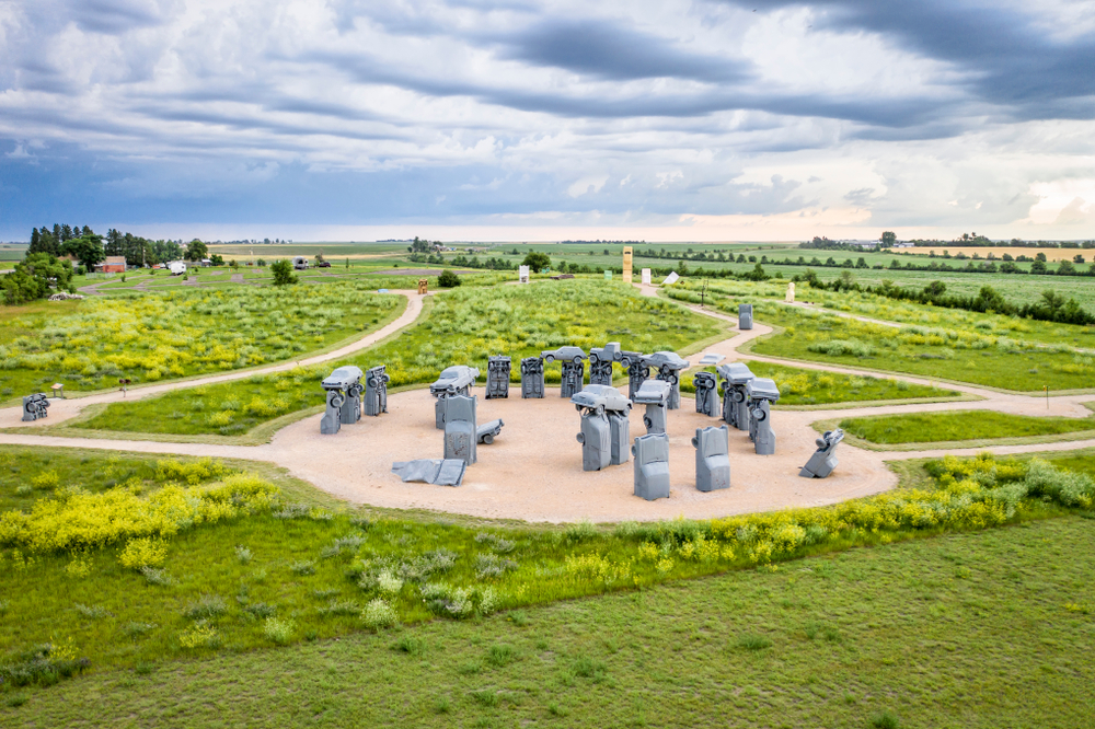 Alliance, NE, USA - July 15., 2019: Carhenge - famous car sculpture created by Jim Reinders, a modern replica of England's Stonehenge using old cars, aaerial perspective in summer scenery.