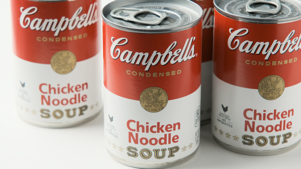 Los Angeles, CA/USA 11/5/2019 Tin cans of Campbells brand Chicken Noodle Soup on White Background
