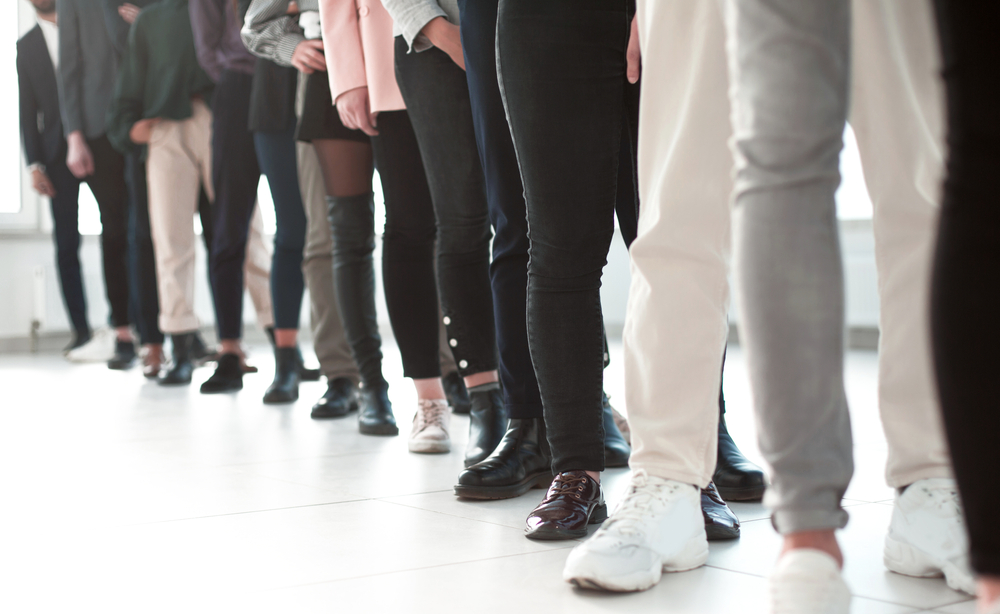 close up. group of young professionals standing in line