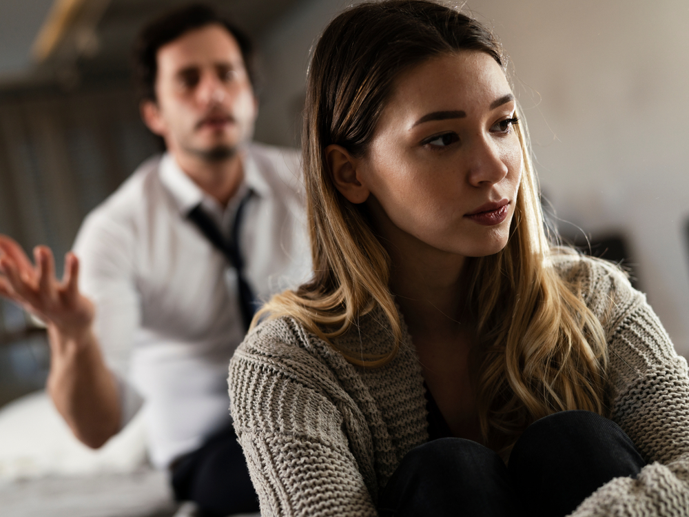 man and woman talking