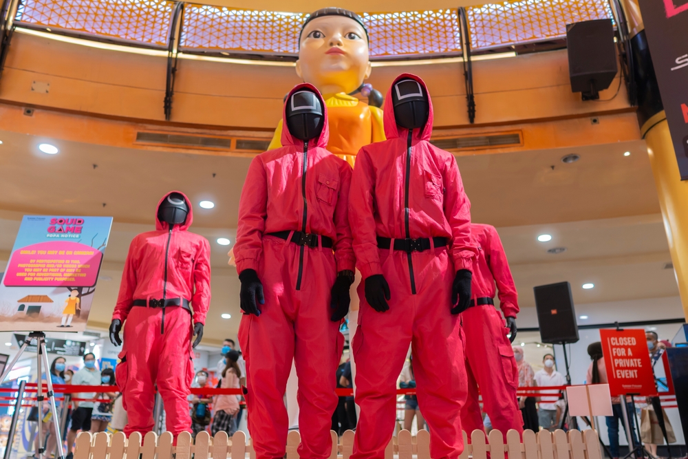 KUALA LUMPUR, MALAYSIA - 24 OCTOBER, 2021 : Guard from Squid Game at the roadshow for the promotion of new Netflix show. Squid Game is a South Korean survival drama television series