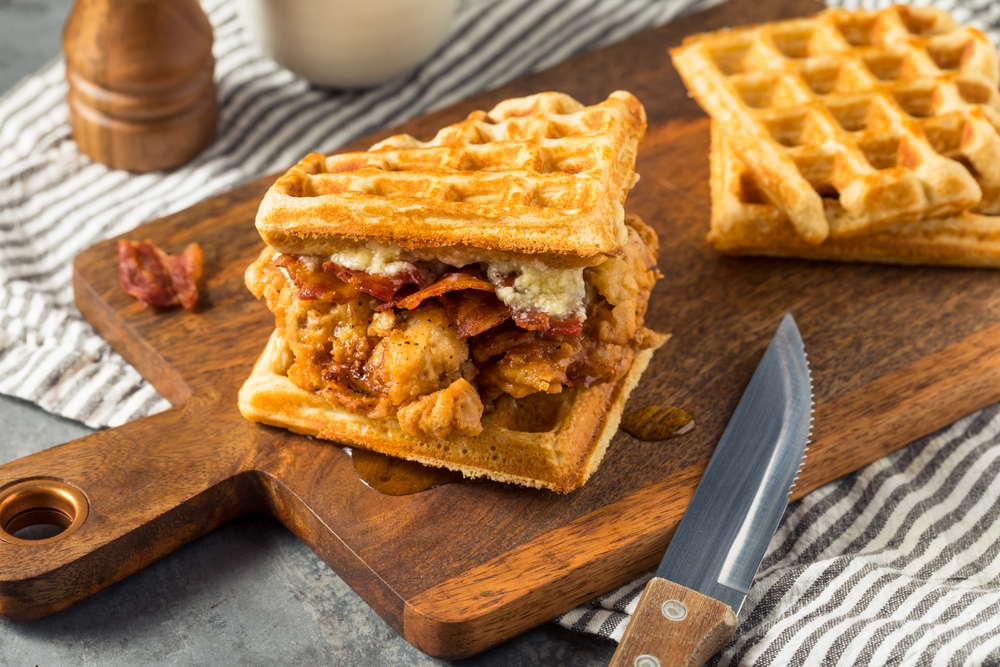 Homemade Chicken and Waffle Sandwich with Bacon and Syrup