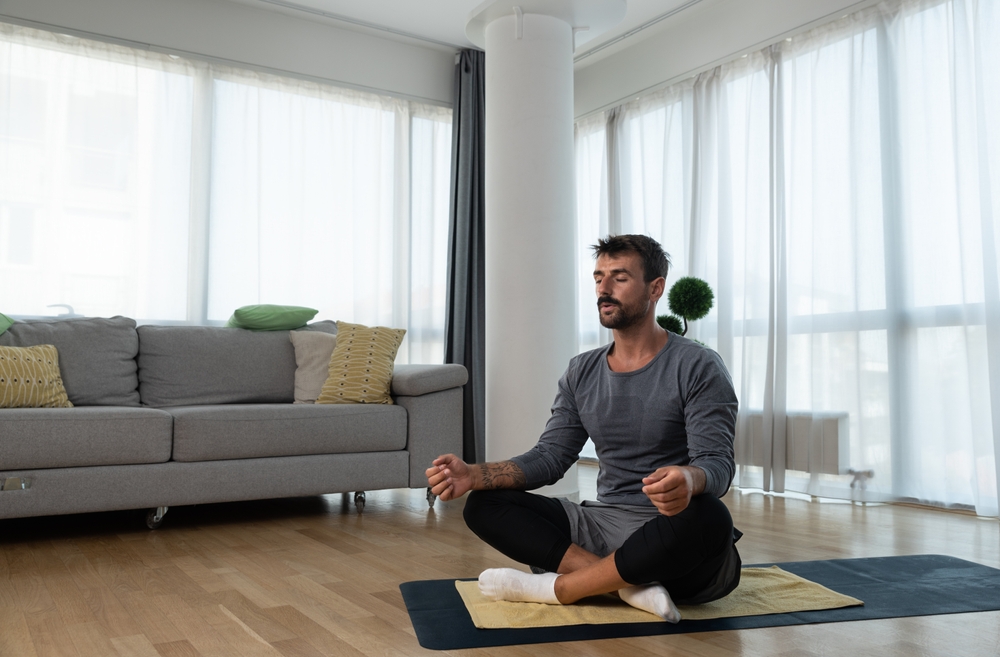 man doing yoga