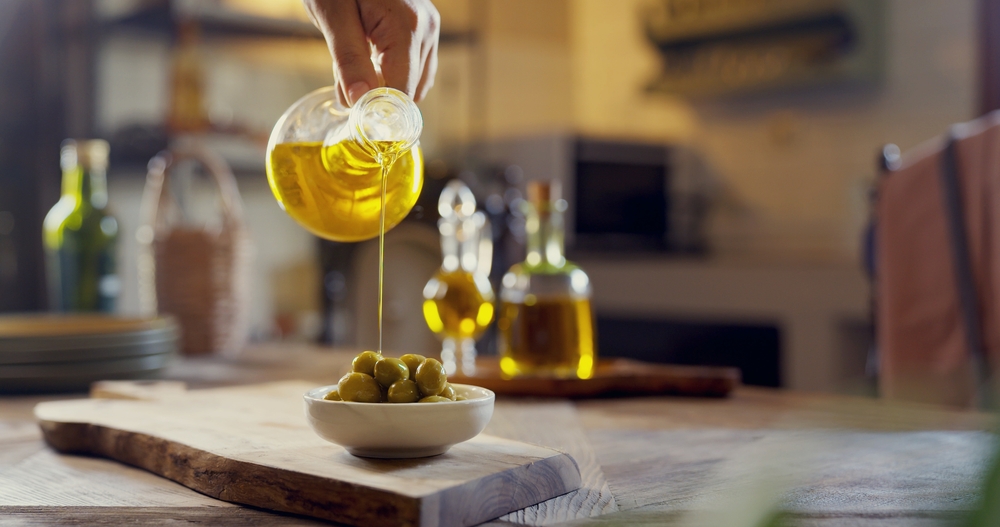 Green olive oil and olive oil concept