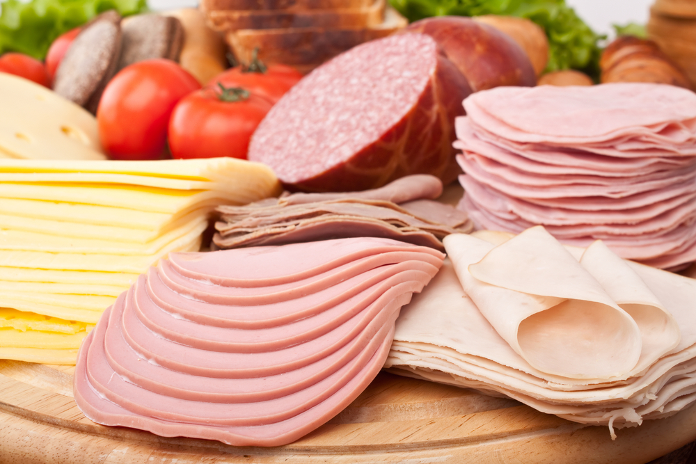 big group of meat, bread and vegetables