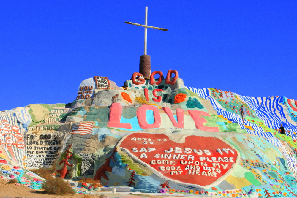 Salvation Mountain is a colorful artificial mountain north of Calipatria, California, near Slab City. It is made from adobe, straw, and thousands of gallons of paint.