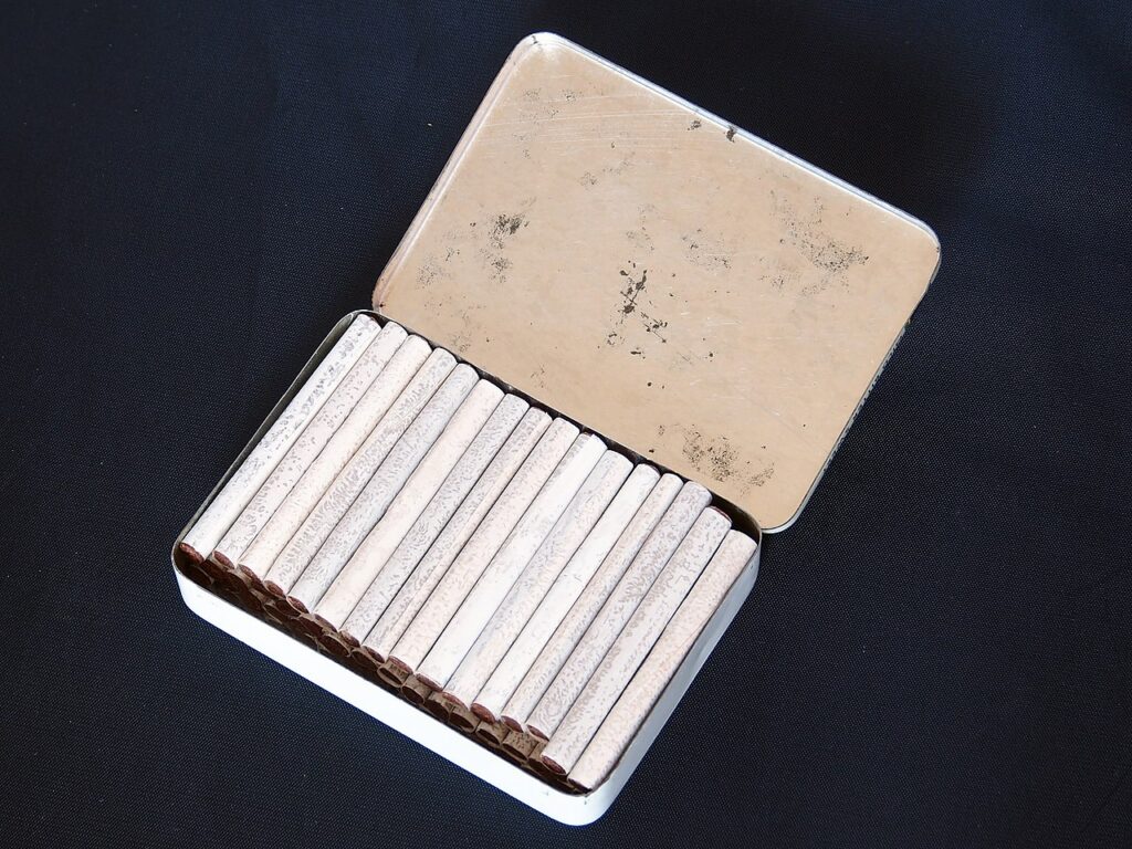 A tin of Droste brand chocolate cigarettes

