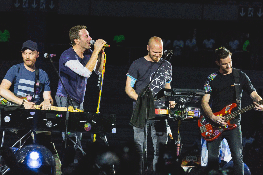 image of Coldplay singing on stage 