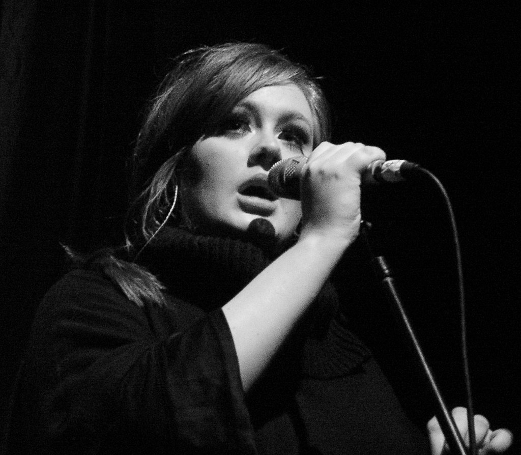 image of Adele singing on stage