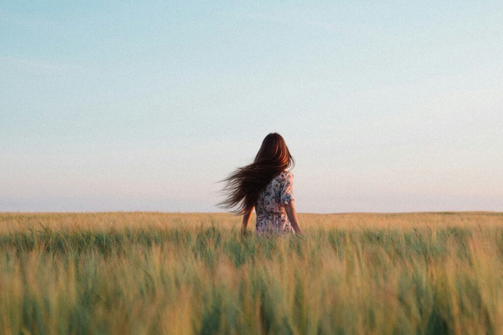 woman standing in field